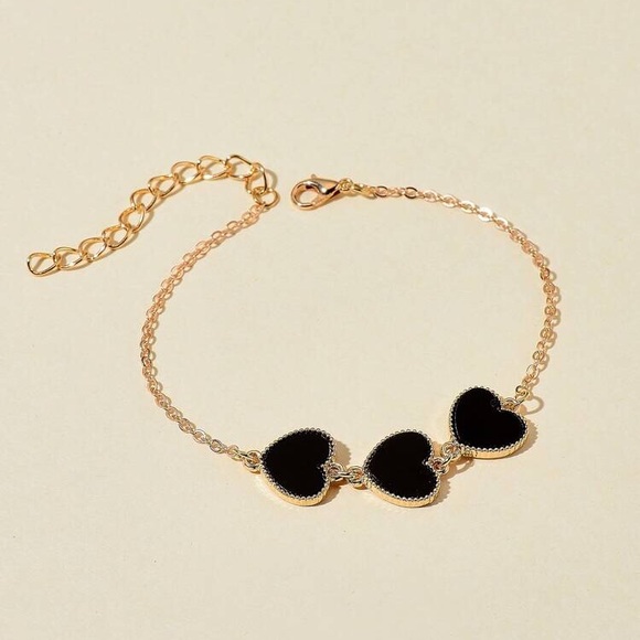 Gold tone bracelet with 3 hearts - Picture 3 of 3